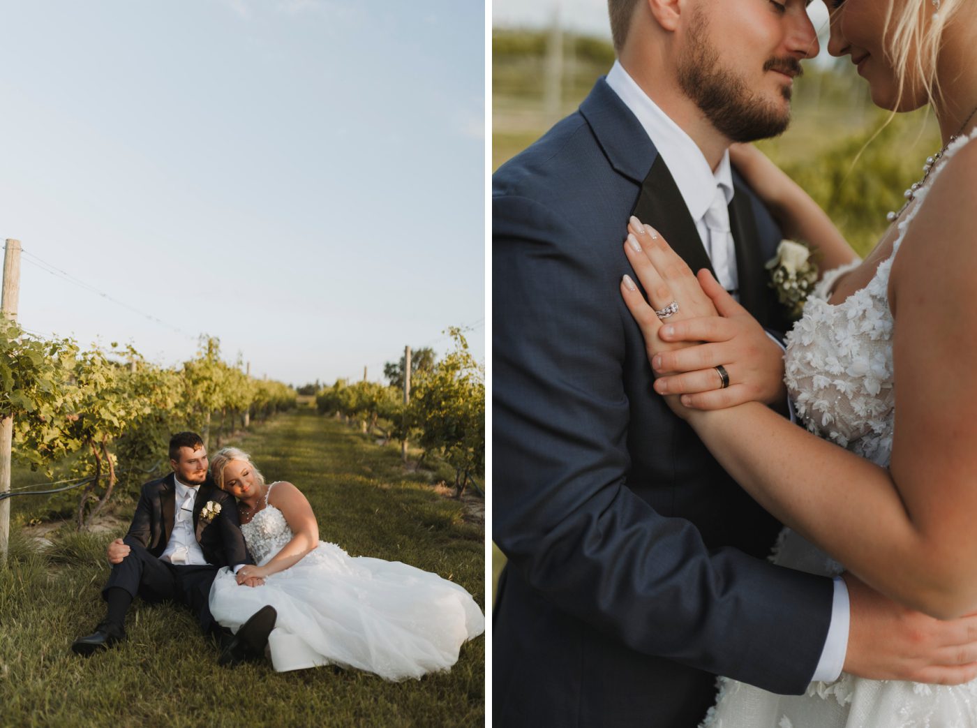 A bride and groom sit on the green grass in the center of a vineyard